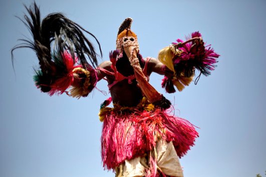 A Dogon Dancer performs A Traditional Dance